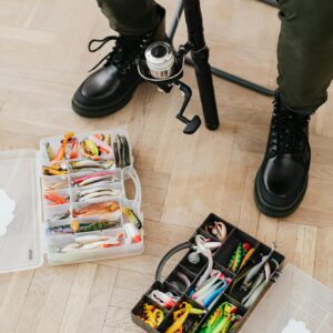 Assorted Fishing Lures on Plastic Containers