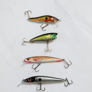 Fishing Lures on White Surface