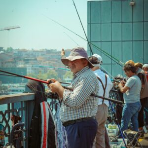 People Fishing on the Bridge