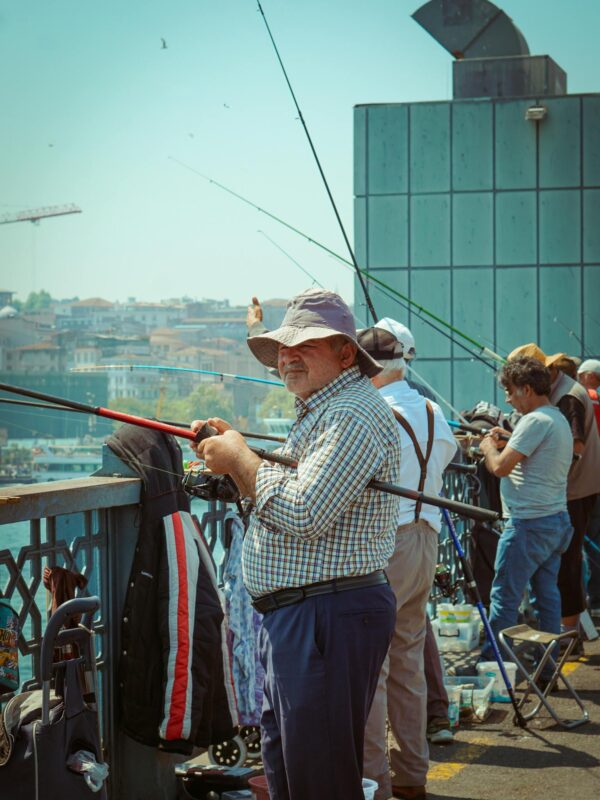 People Fishing on the Bridge